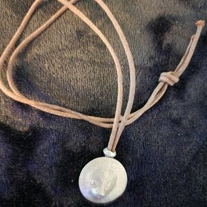 Silver Tone Pendant Necklace with Brown Cord
